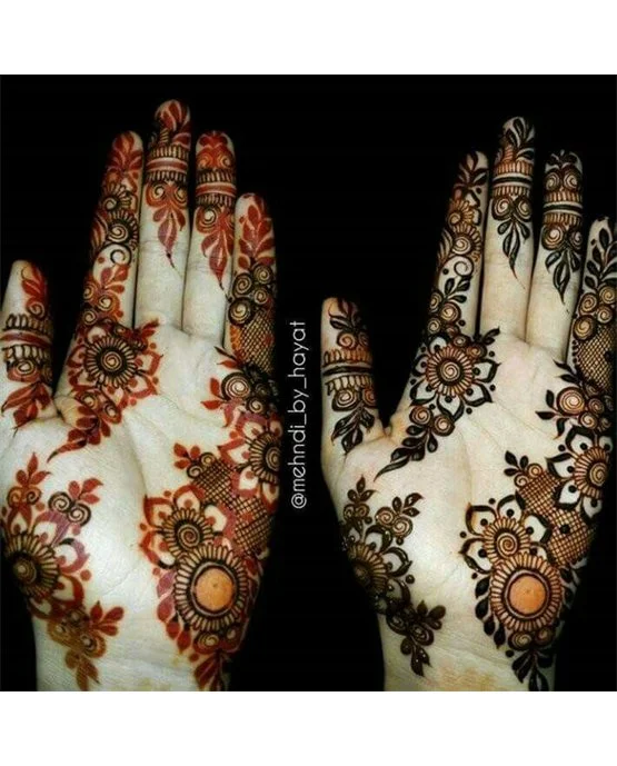 Ornate Pendant And Spiral Featuring Front Hand Mehndi Design